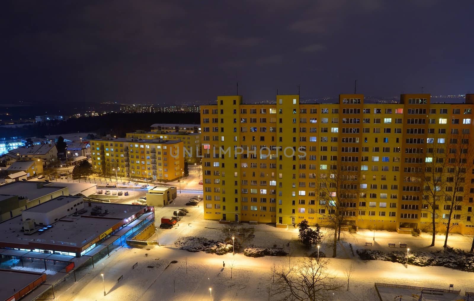 Communist residential blocks and houses at night.