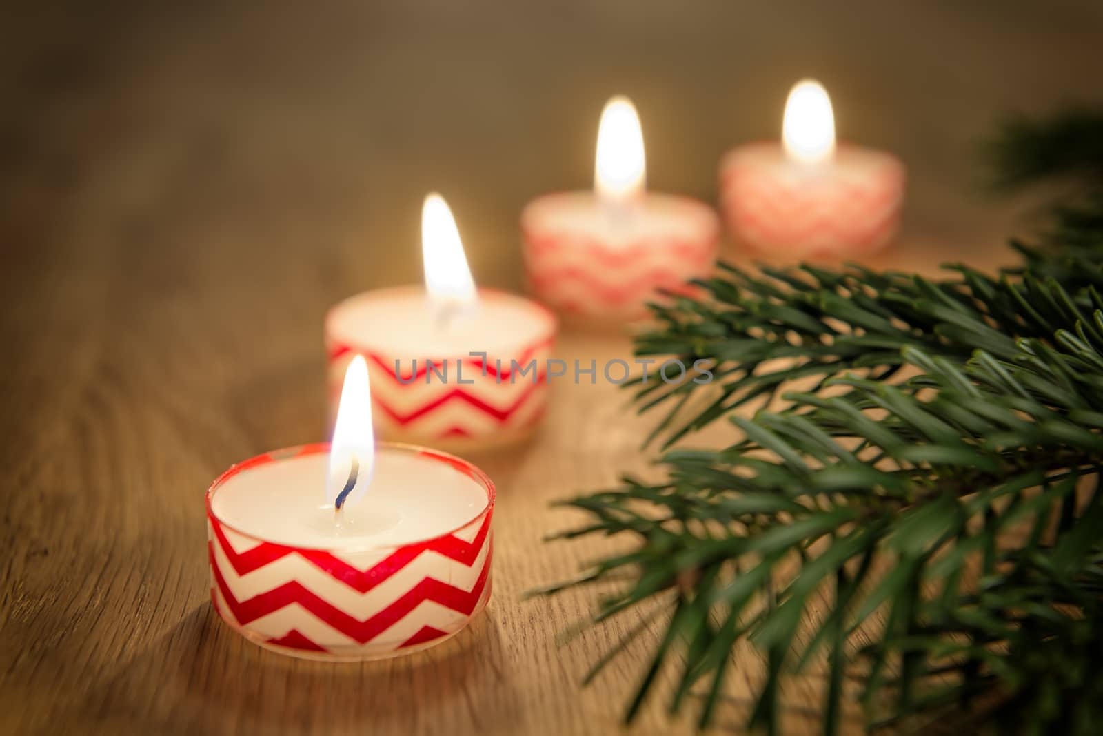 Romantic image of candles on a wooden table
