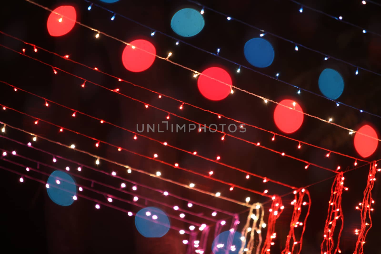 Decoration done with colorful lighting wires during a traditional festival or ceremony.