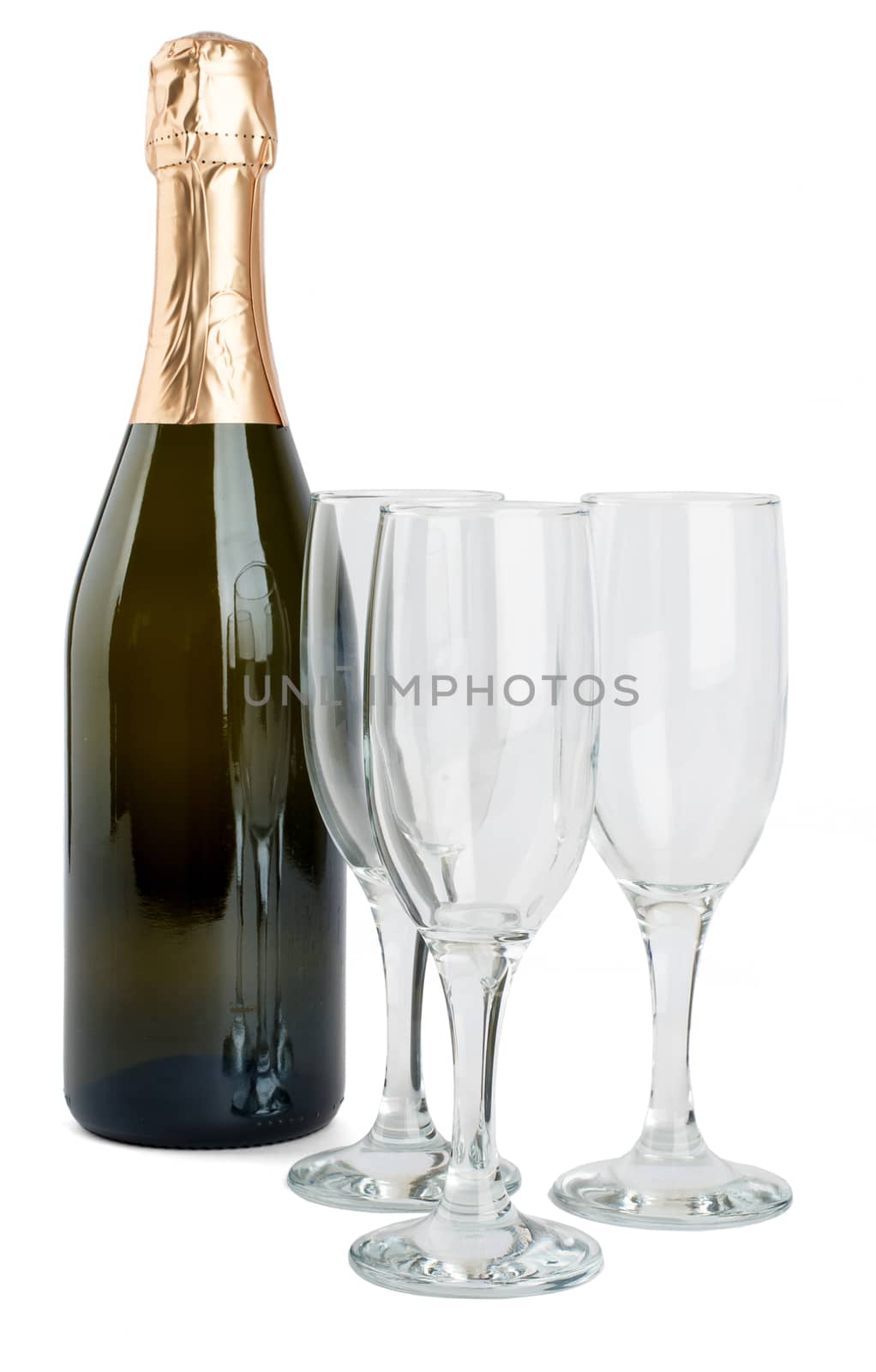 Champagne bottle and three champagne glasses isolated on white background