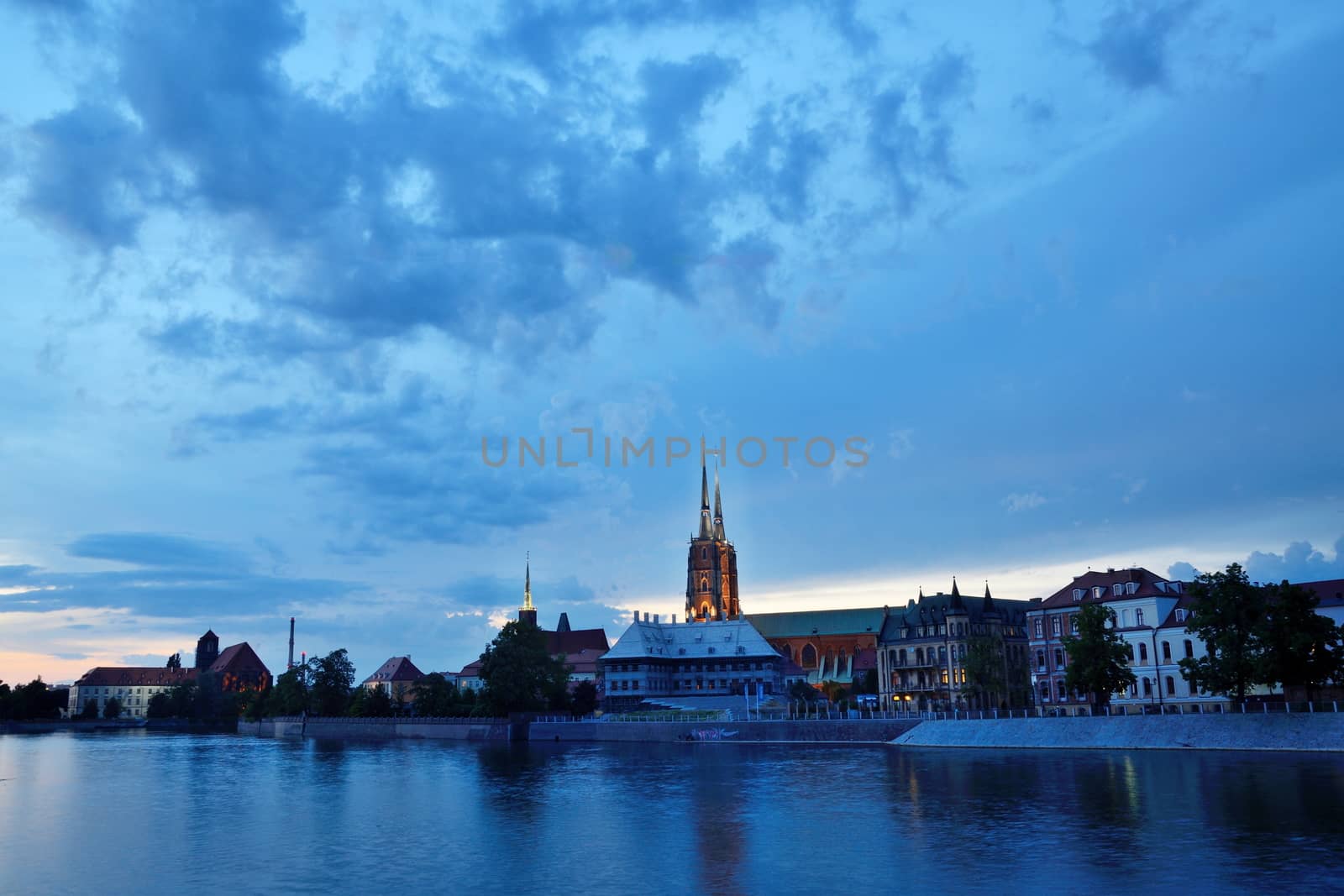 WROCLAW, POLAND - MAY 30: Wroclaw general cityscape by night with Odra river and Cathedral. In 2016 Wroclaw is European Capitol of Culture. 