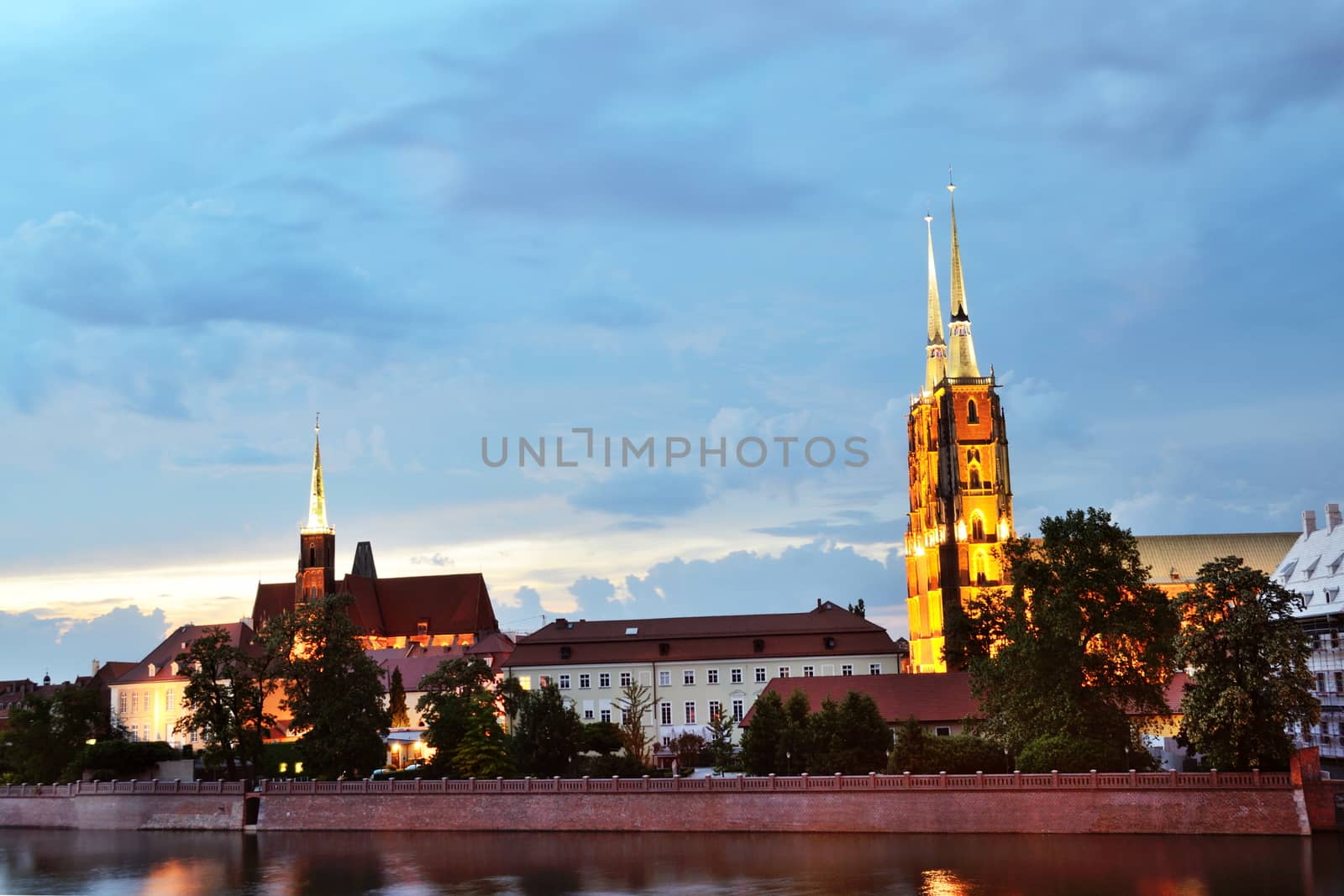 WROCLAW, POLAND - MAY 30: Wroclaw general cityscape by night with Odra river and Cathedral. In 2016 Wroclaw is European Capitol of Culture. 