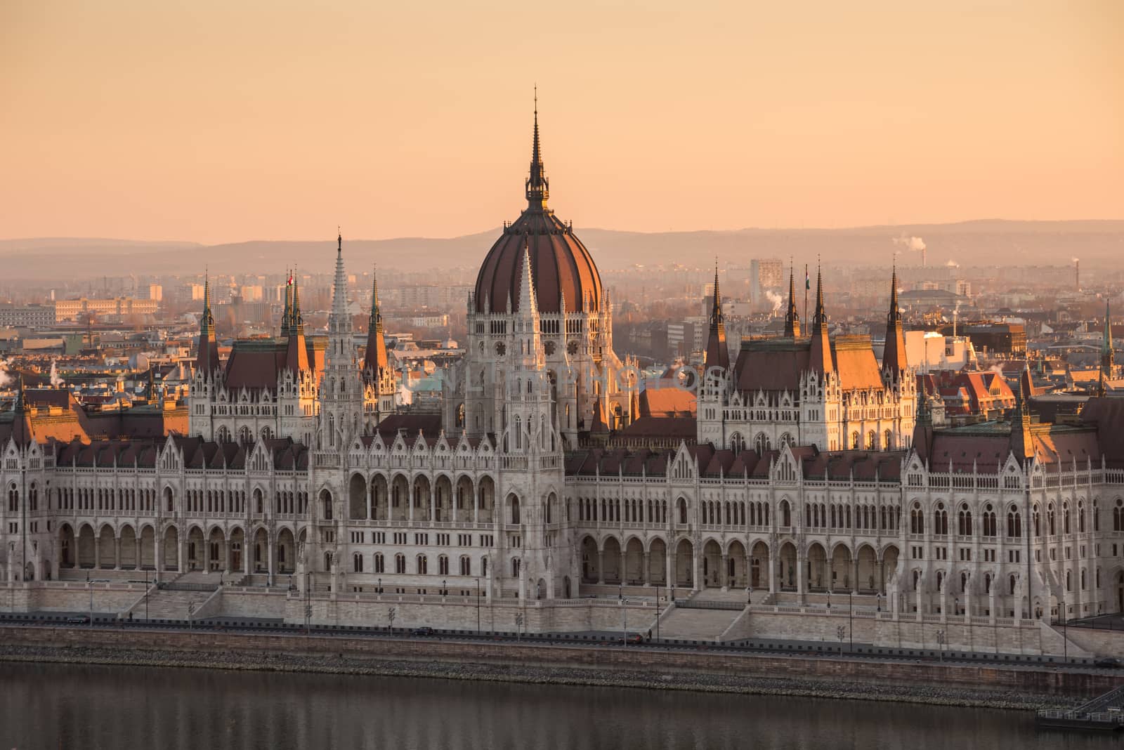 Illuminated Hungarian Parliament Building in Budapest, Hungary at Sunrise