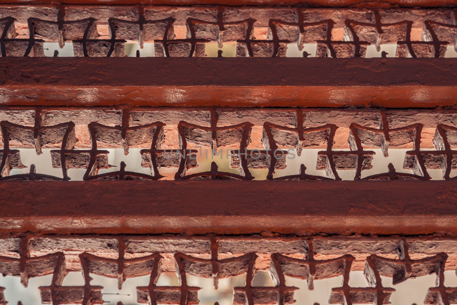 Close Up of red old vintage Metal painted Grate.