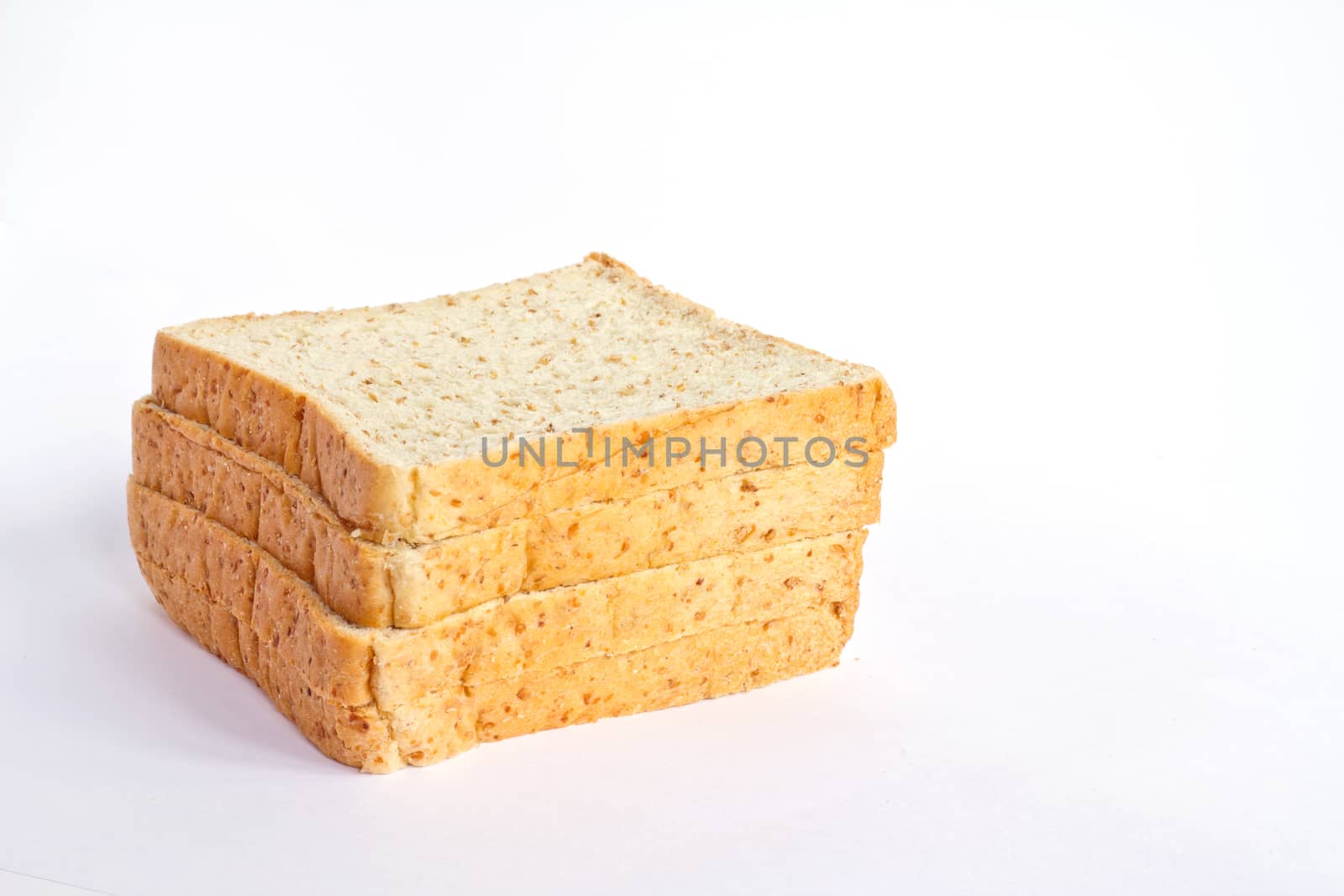 slices of whole wheat bread isolated on white background 