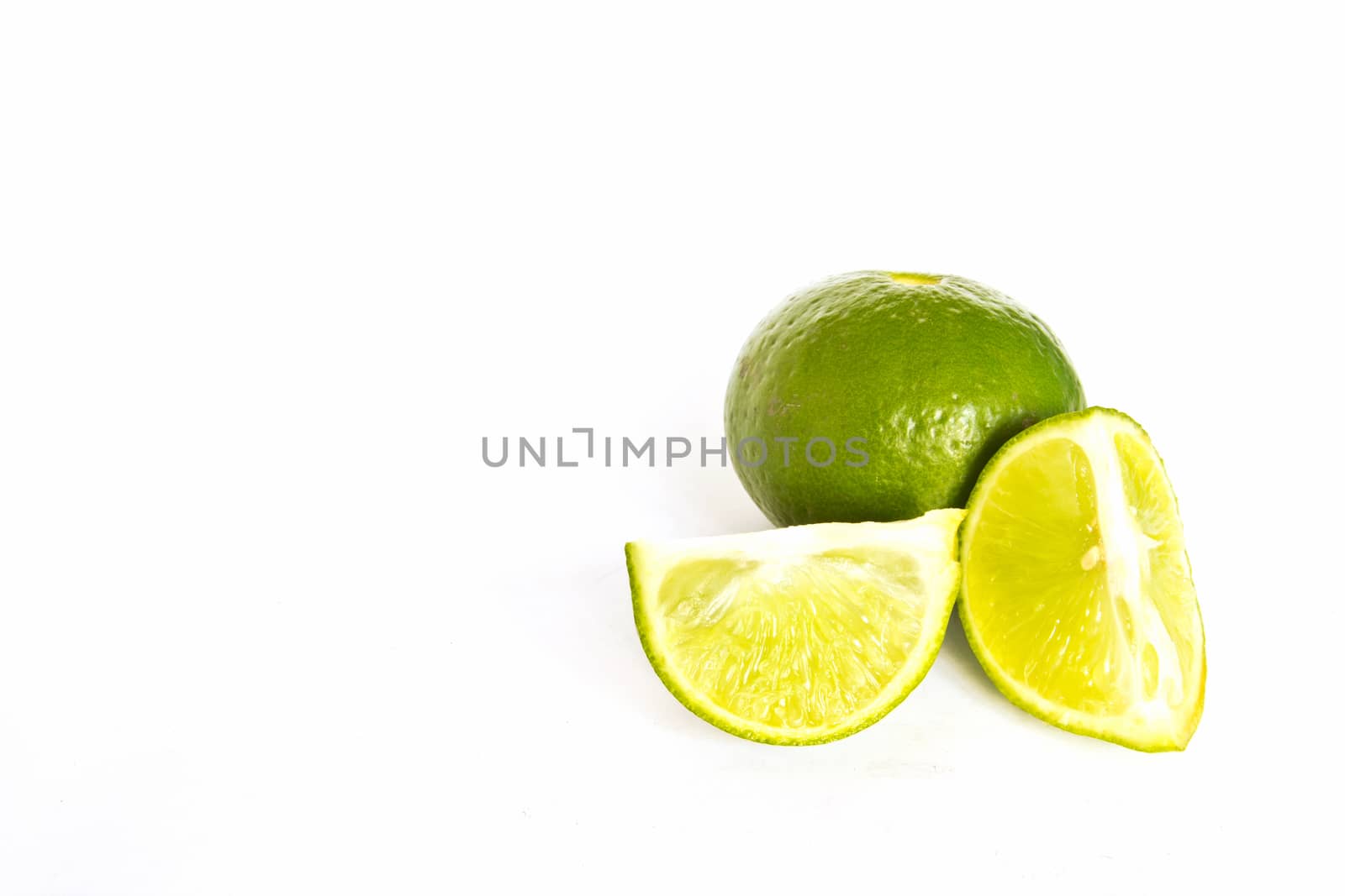 Fresh ripe lime. Isolated on white background 
