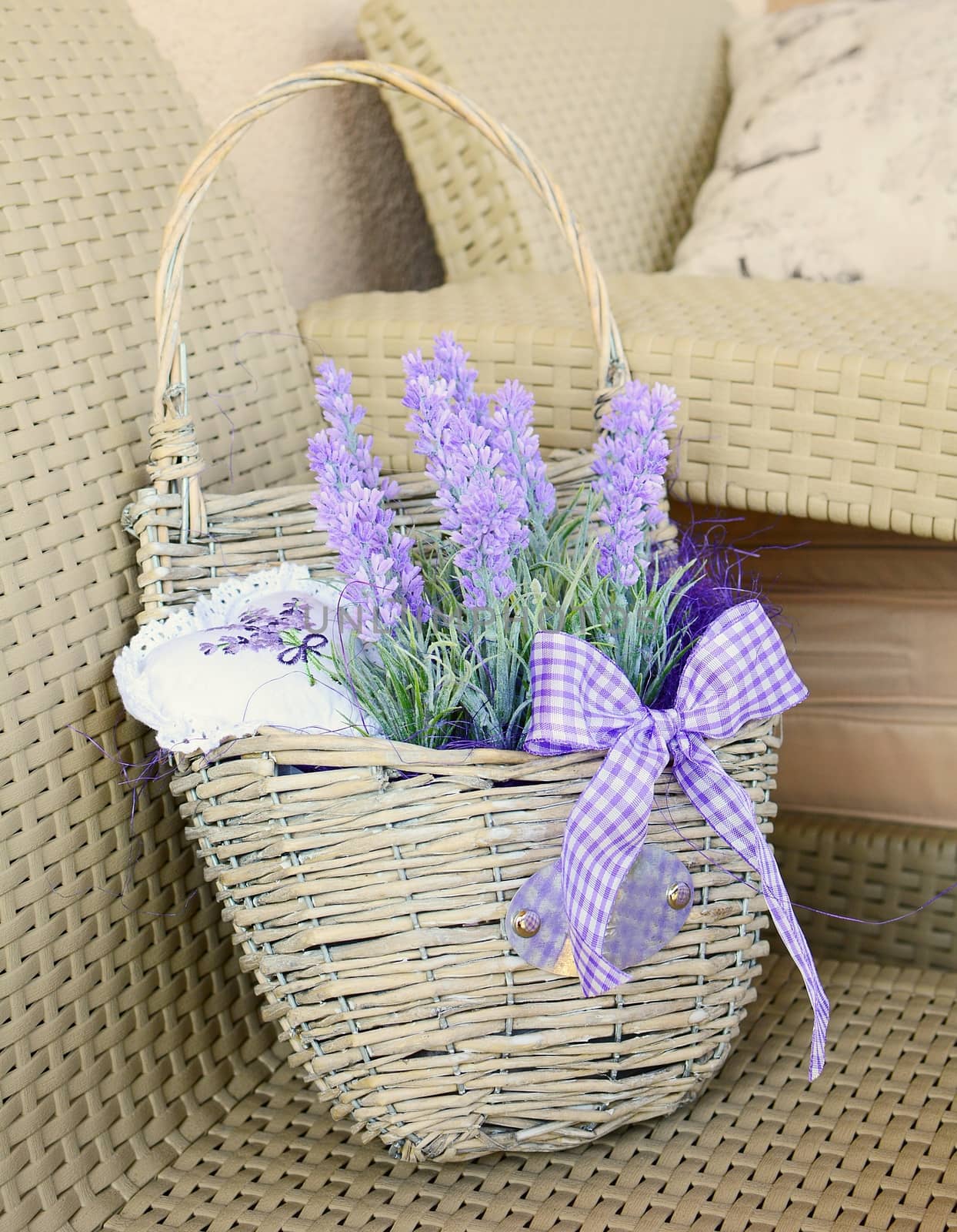 Basket with lavender and ribbon home decoration.