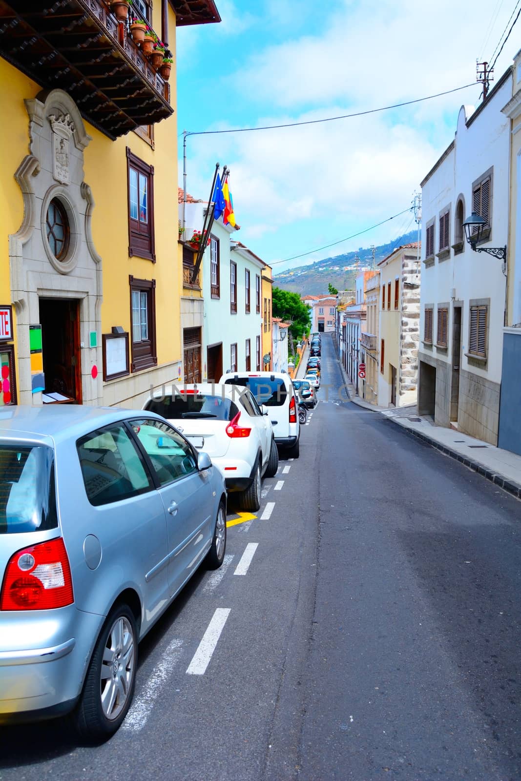 Street with paking cars in the old town La Orotava in the Tenerife, Spain.