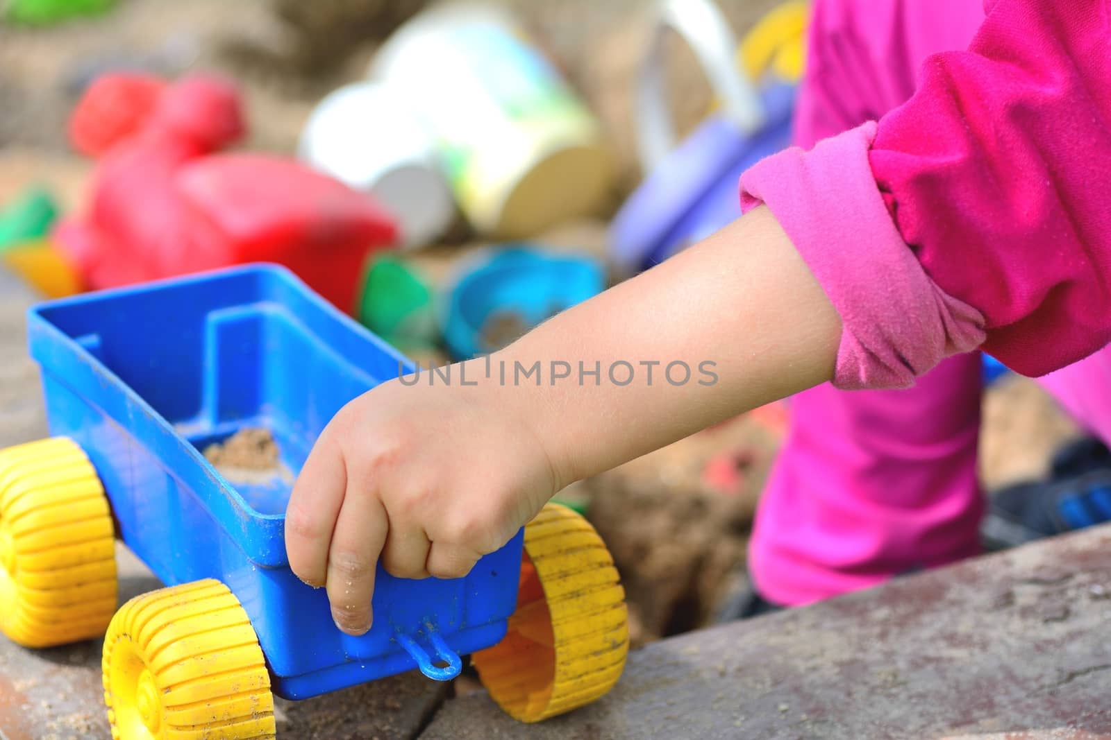 Playing at sandpit by hamik