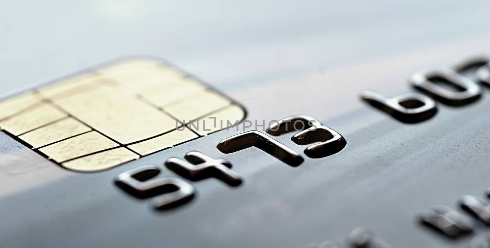 Chip of the gray credit card, closeup shot.