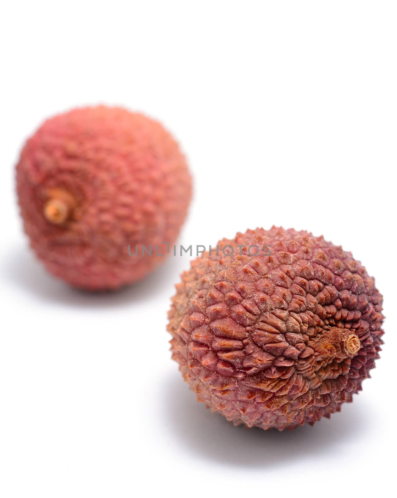 Litchi (Litchi chinensis) placed on the white background.