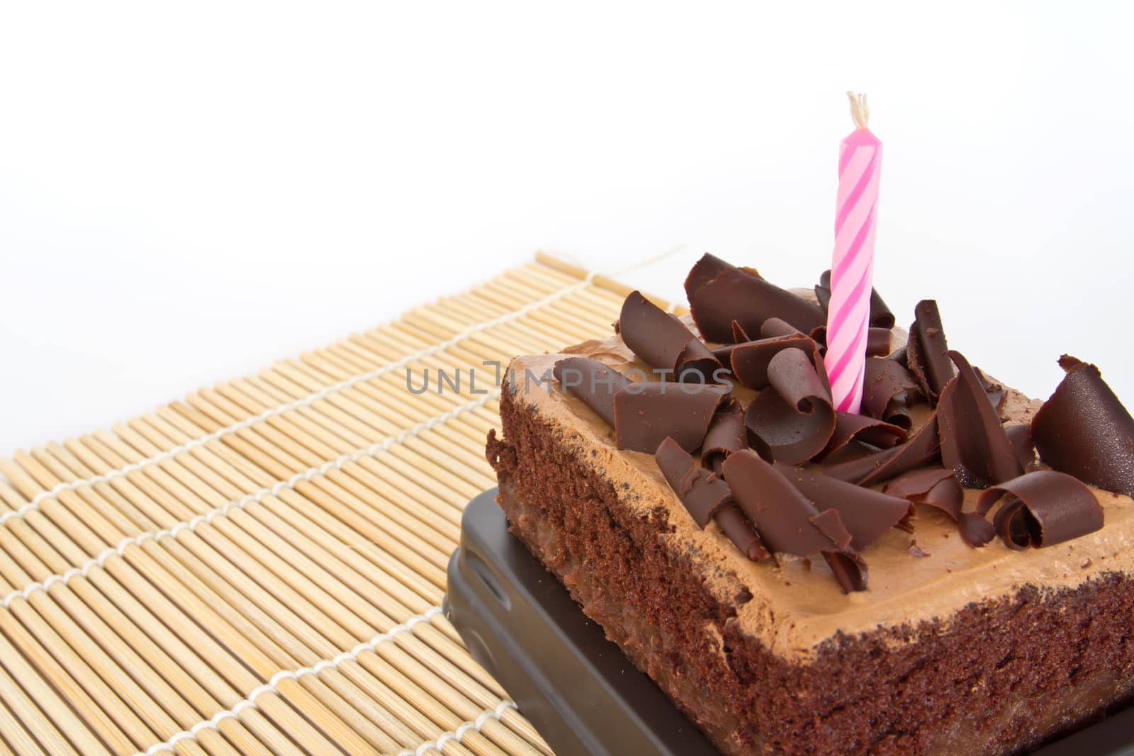 Chocolate Brithday Cake in isolated shot 