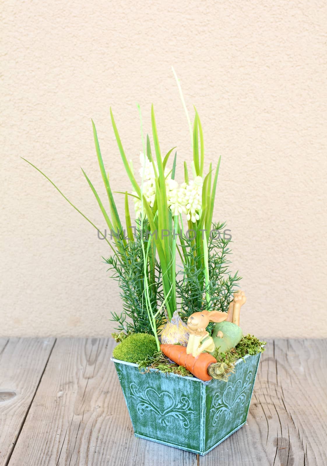 Easter floral home decoration on the table. Homemade arrangement.