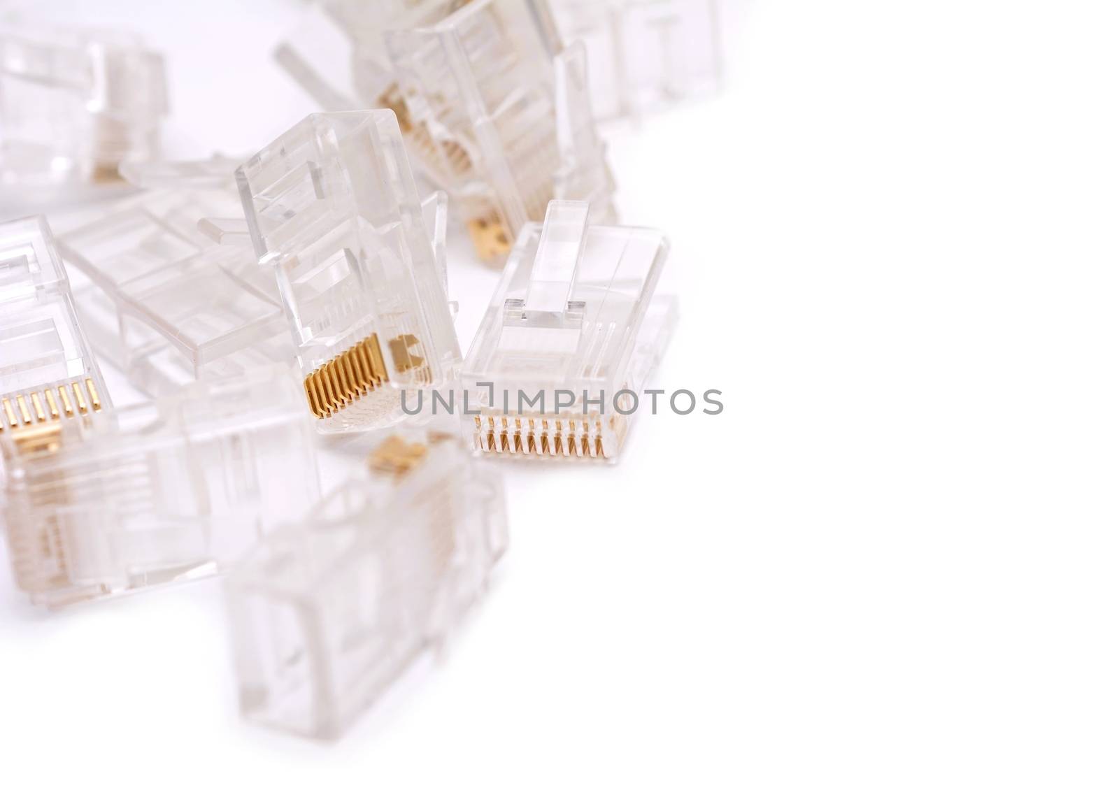 Closeup of the ethernet RJ45  installing connectors on a white background.