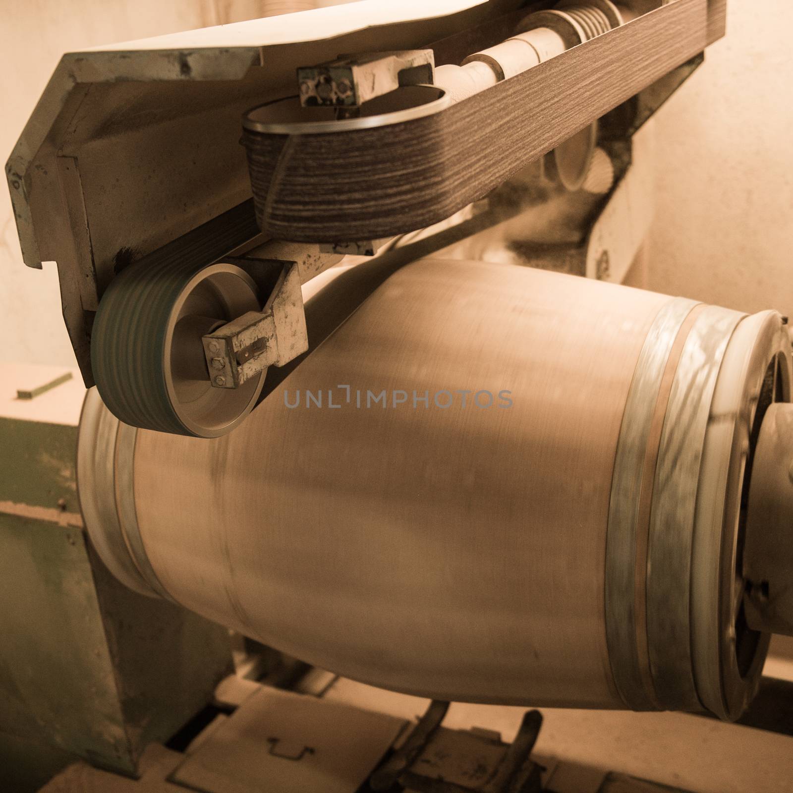 Cleaning a barrel with a sanding machine, Bordeaux Vineyard, France