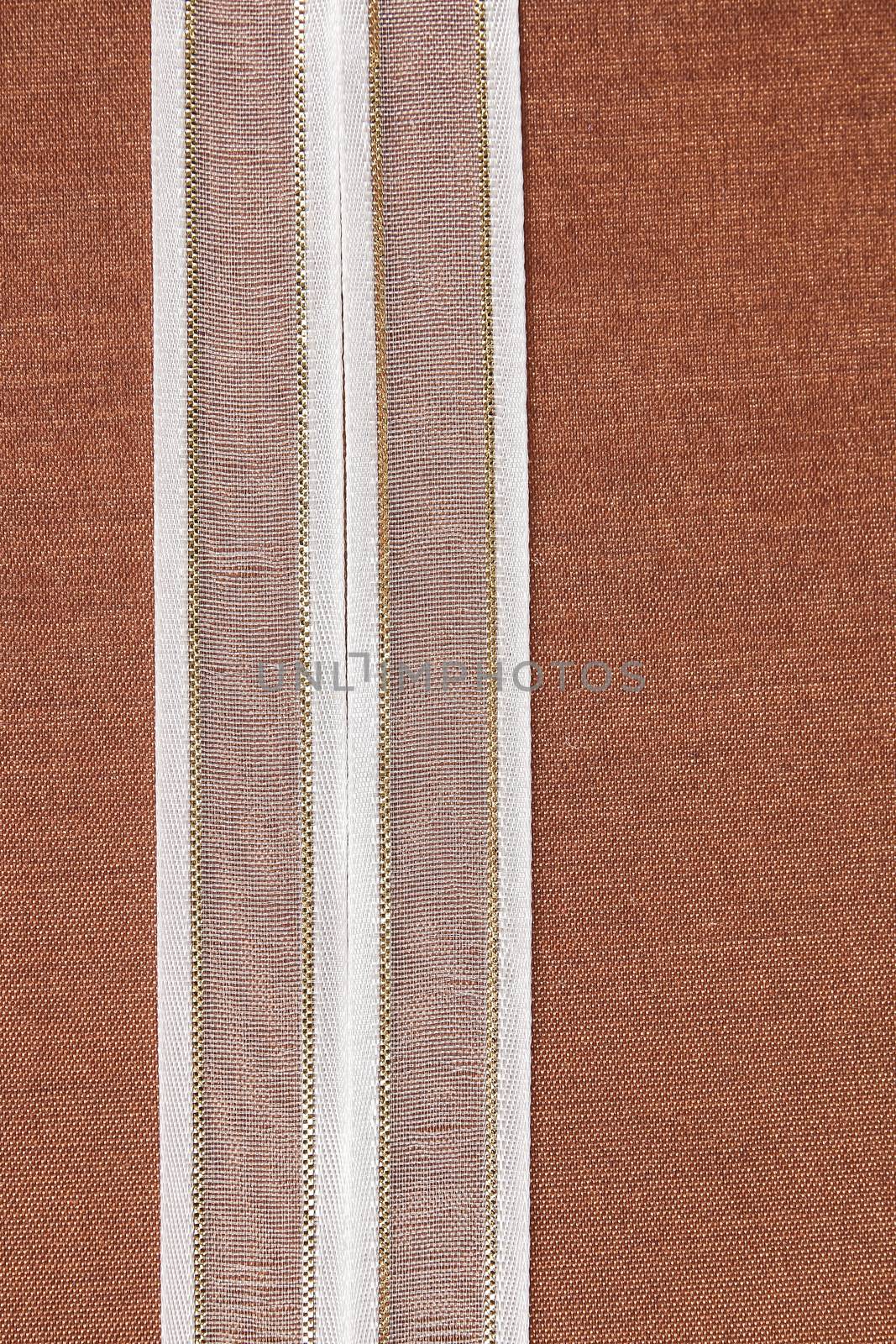 white ribbon on natural cotton, bright cloth fabric background. Retro style