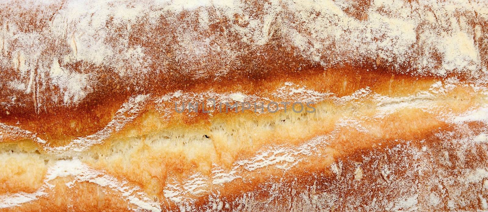 Bread crust texture closeup. Fresh baked bread. Bread crust background.