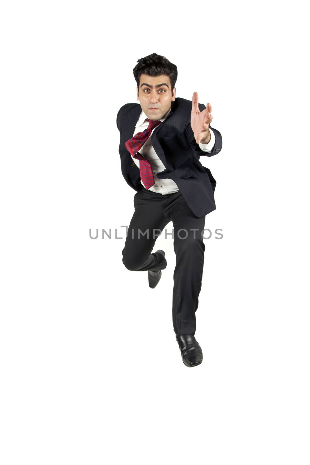 Man in suit jumping running by haiderazim