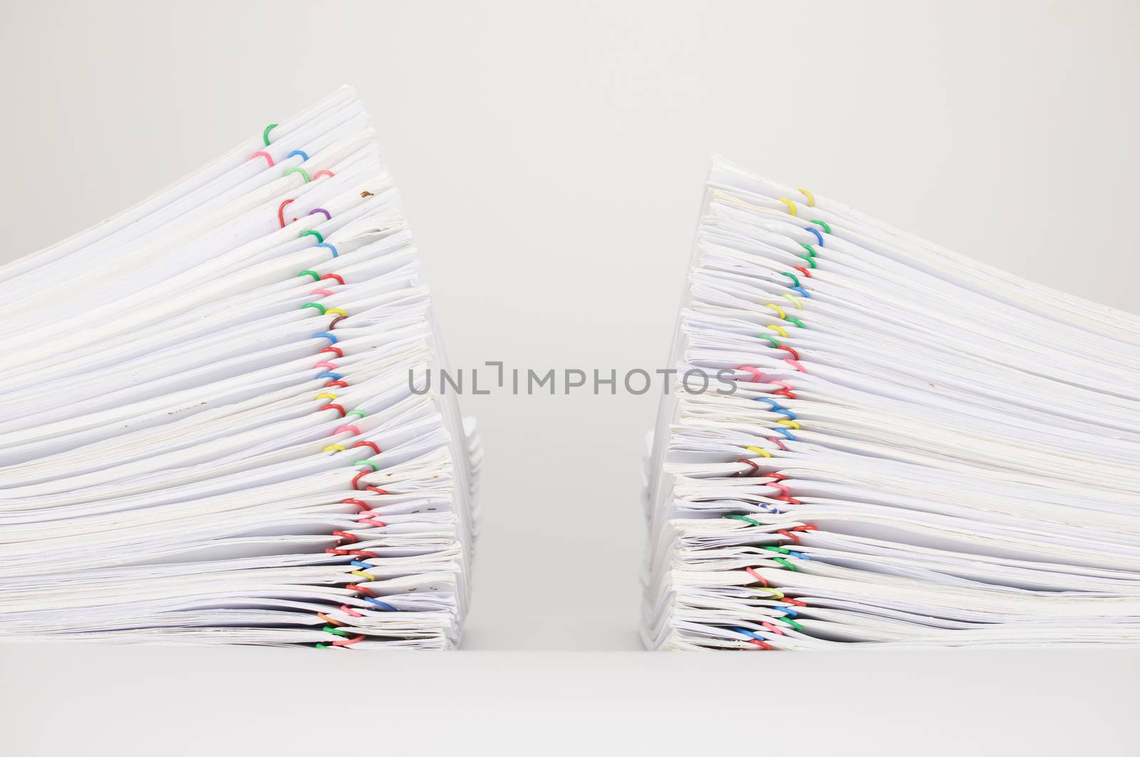 Dual pile overload document of report on white background by eaglesky