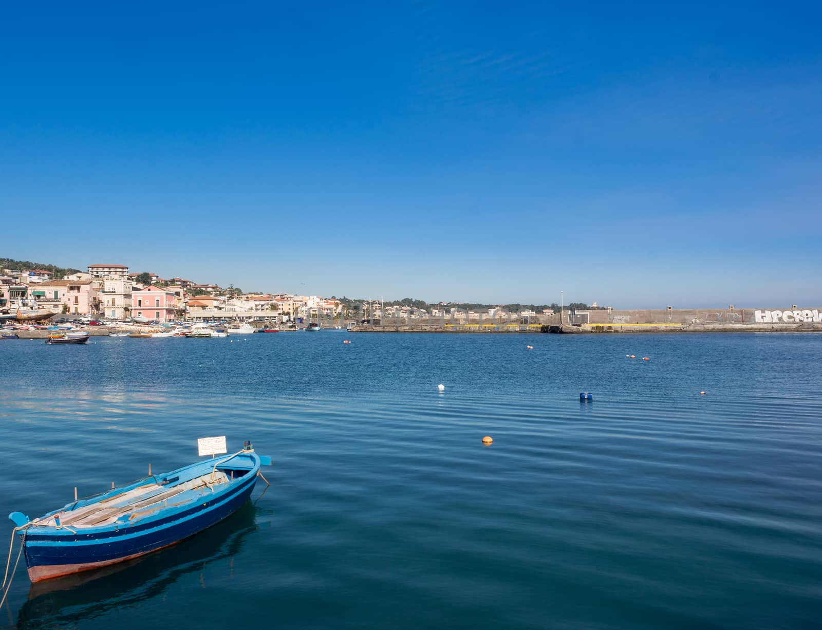 The small boat in the sicilian marina.