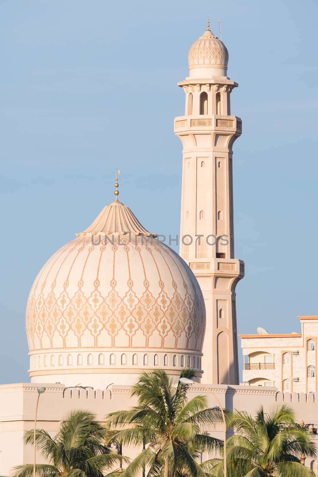 Dome and minaret of The Sultan Qaboos Grand Mosque in Salalah, Dhofar Region of Oman.