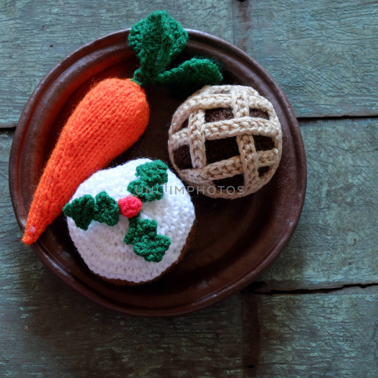 Group of food as carrot, mince pie, cupcake, meal to treat for santa claus and rudolph on christmas night, amazing xmas ornament handmade by knit from colorful yarn