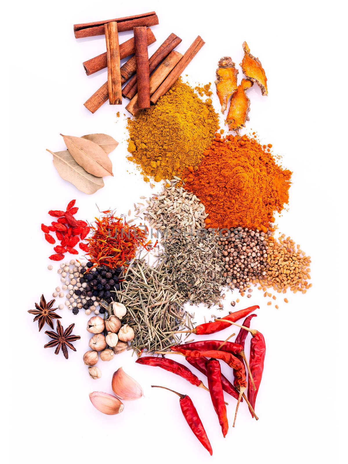 Assorted of spices black pepper ,white pepper,fenugreek,cumin ,bay leaf ,cinnamon,thyme,matrimony vine(chinese wolfberry),safflower,rosemary and fennel seeds isolated on white background.