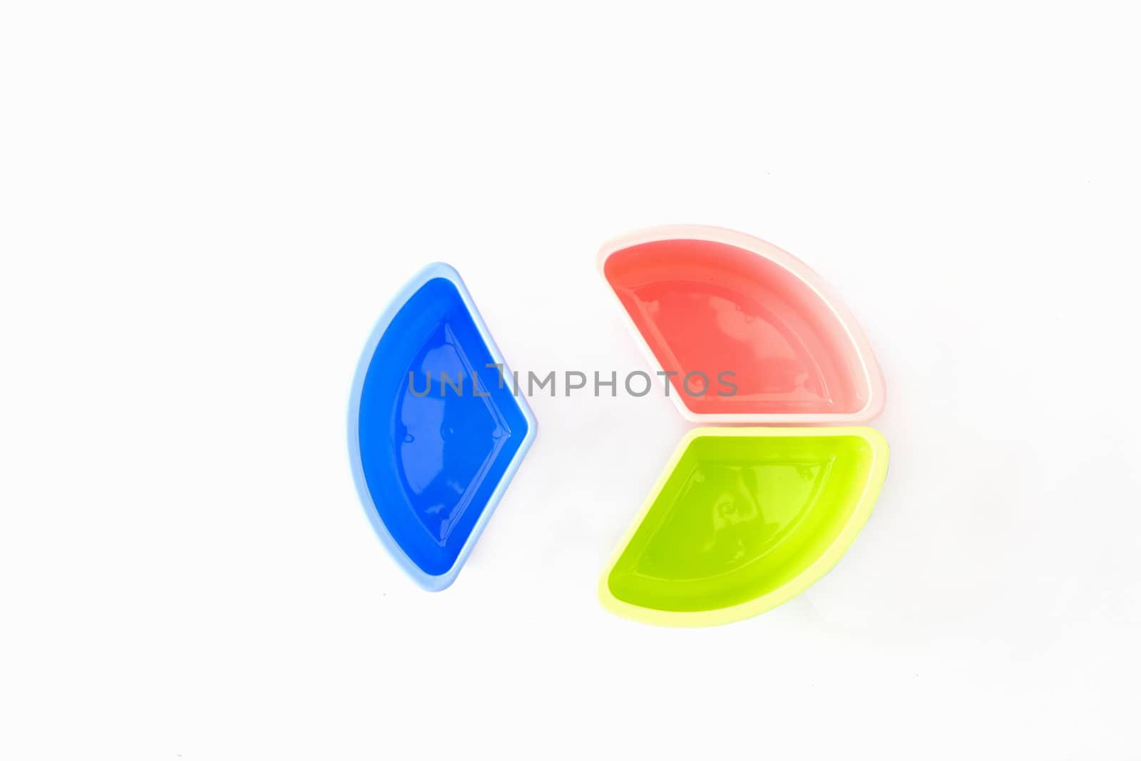 Multi-coloured disposable plastic isolated on white background  by ekachailo