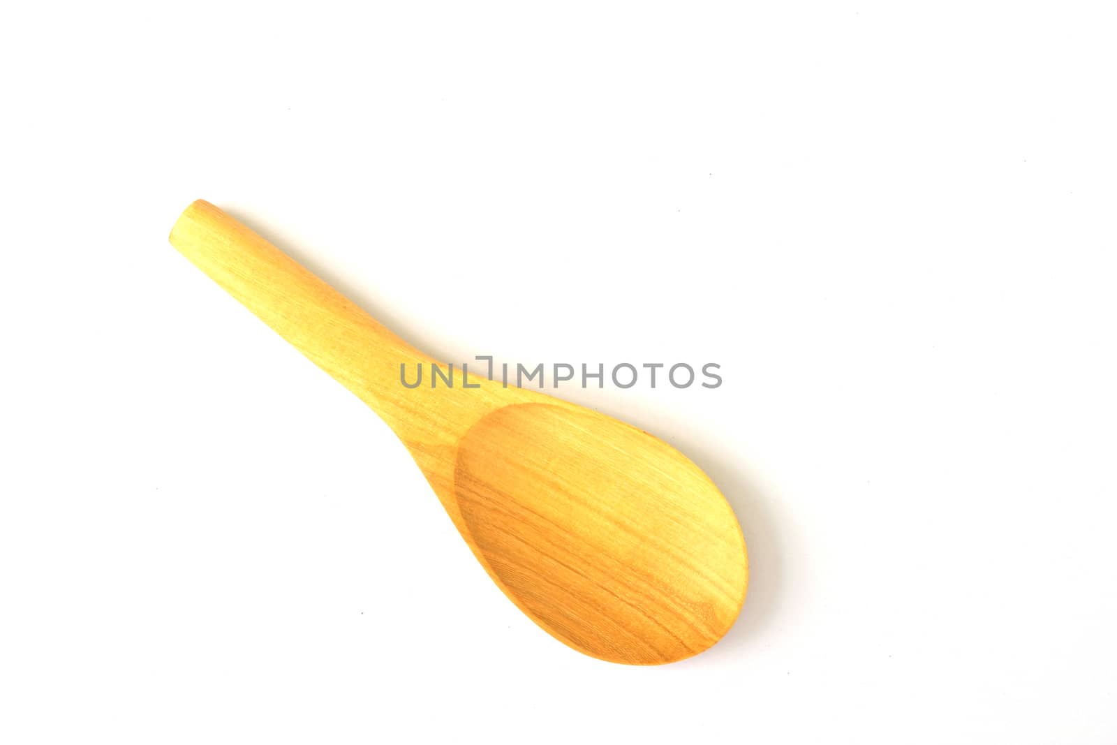 close up of wooden spoon on white background with clipping path 
