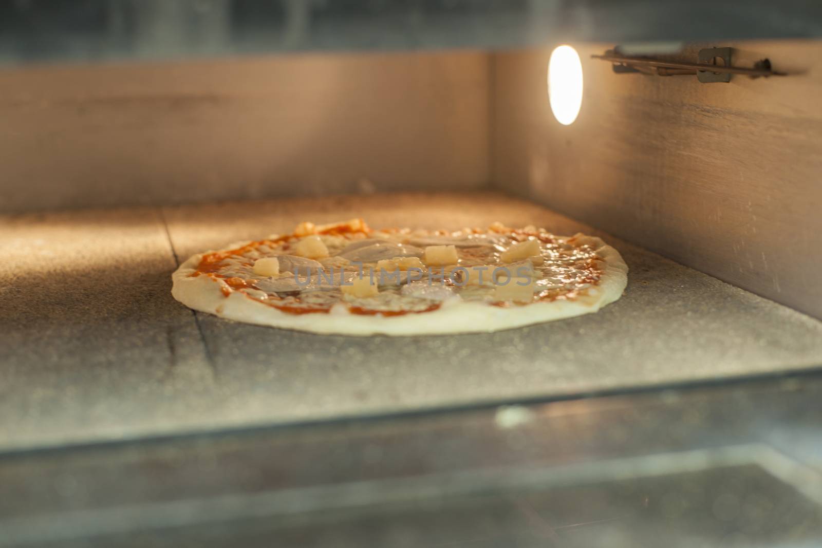 Pizza baking in the oven. High resolution