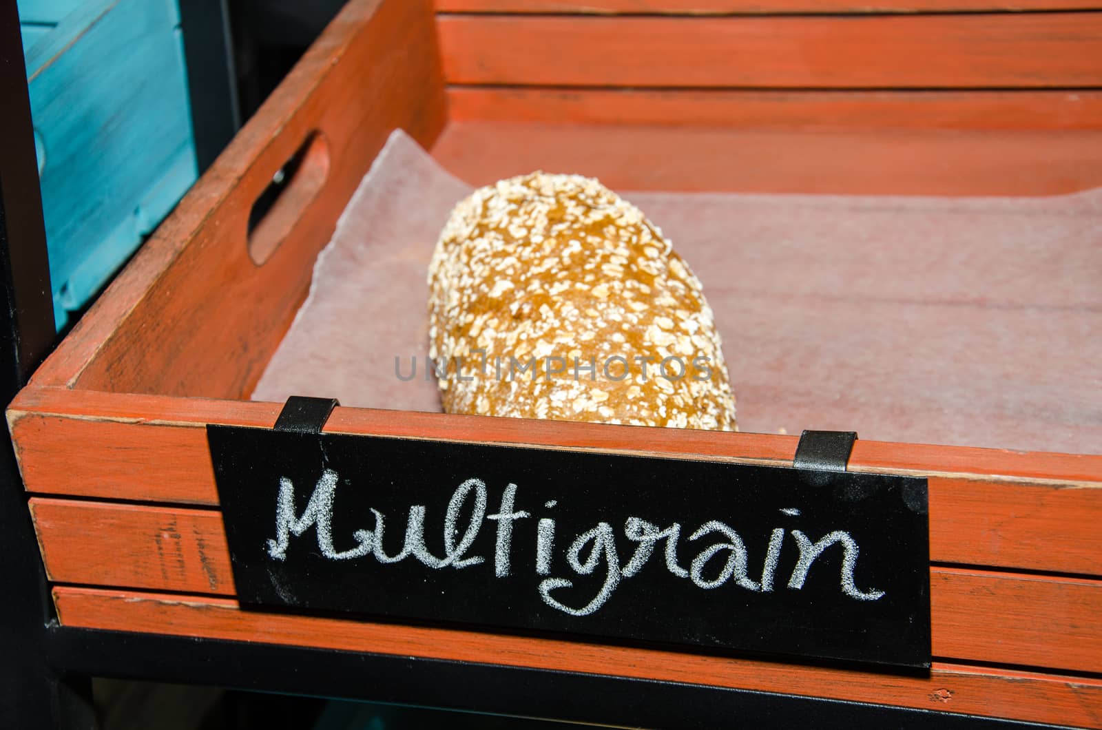 Mulitigrain bread, Whole wheat bread, on wooden basket, made from flour.