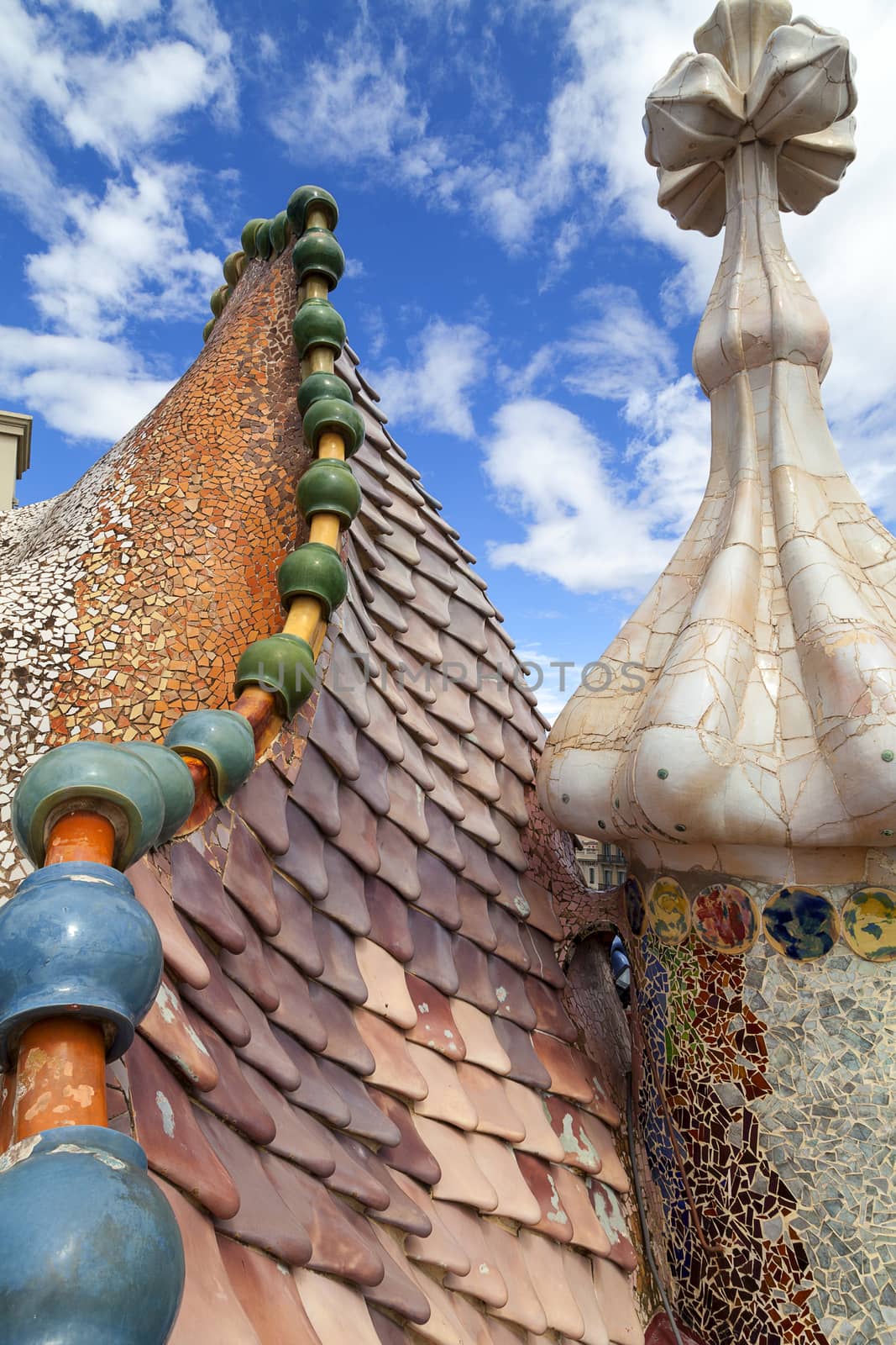 Barcelona, Spain - May 11,2016 : Casa Batllo,  housetop , details with ceramic mosaic. Building  redesigned in 1904 by Gaudi located in the center of Barcelona, it  is on the UNESCO World Heritage Site.