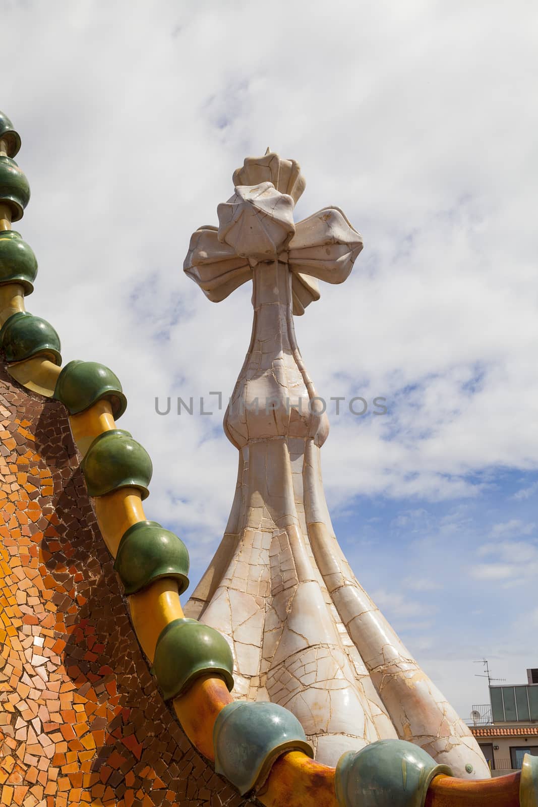 Barcelona, Spain - May 11,2016 : Casa Batllo,  housetop , details with ceramic mosaic. Building  redesigned in 1904 by Gaudi located in the center of Barcelona, it  is on the UNESCO World Heritage Site.