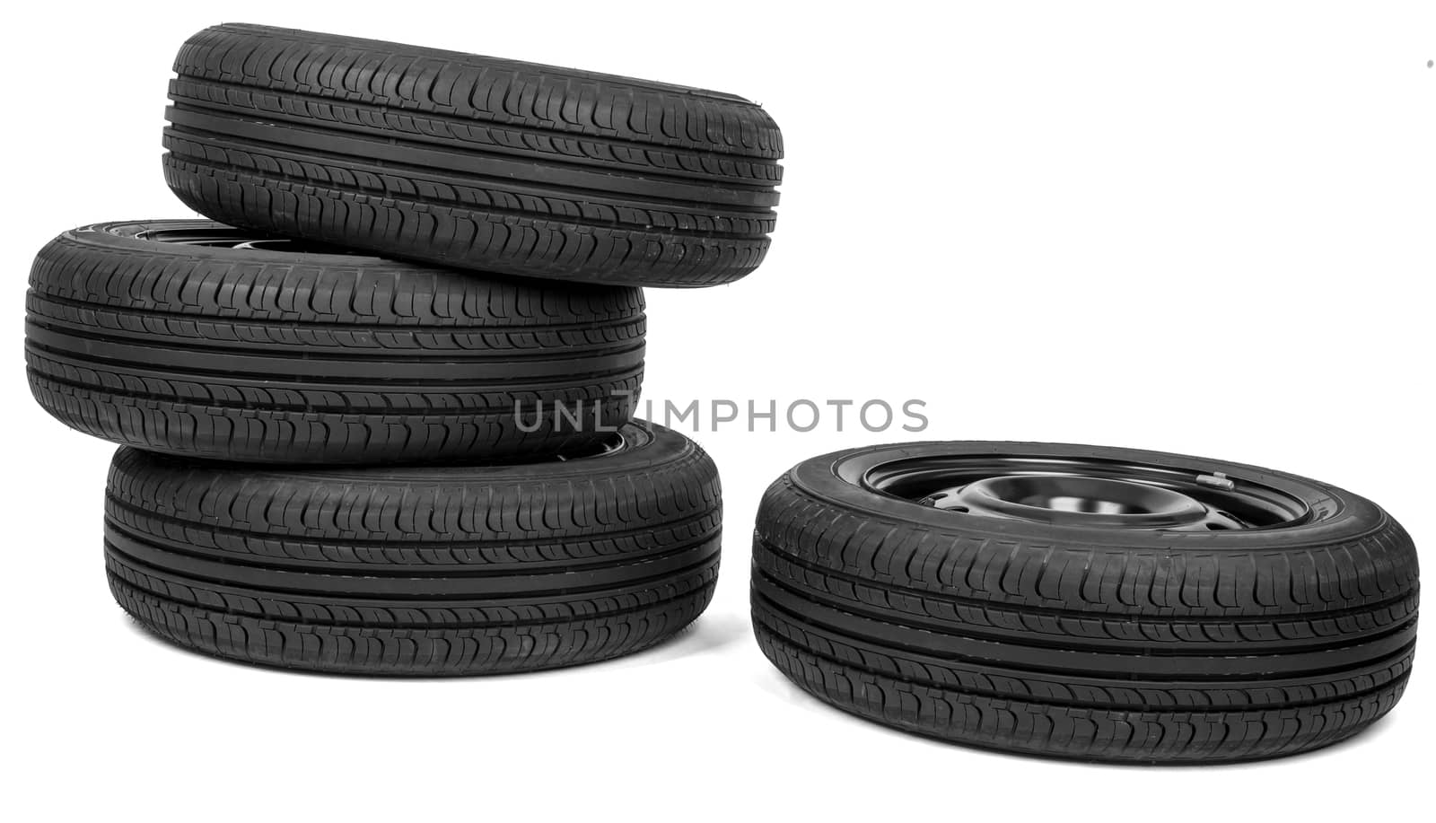 Automobile wheels with discs isolated on white background