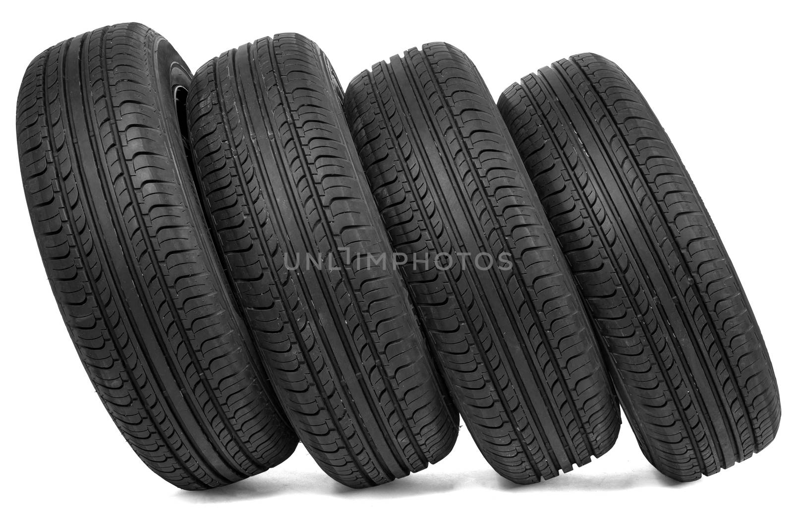 Stack of car wheels. Isolated on white background
