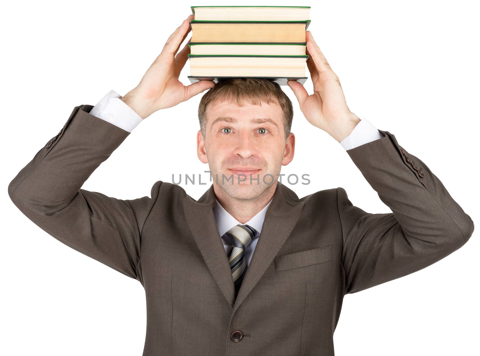 Young man holding stack of books isolated on white background