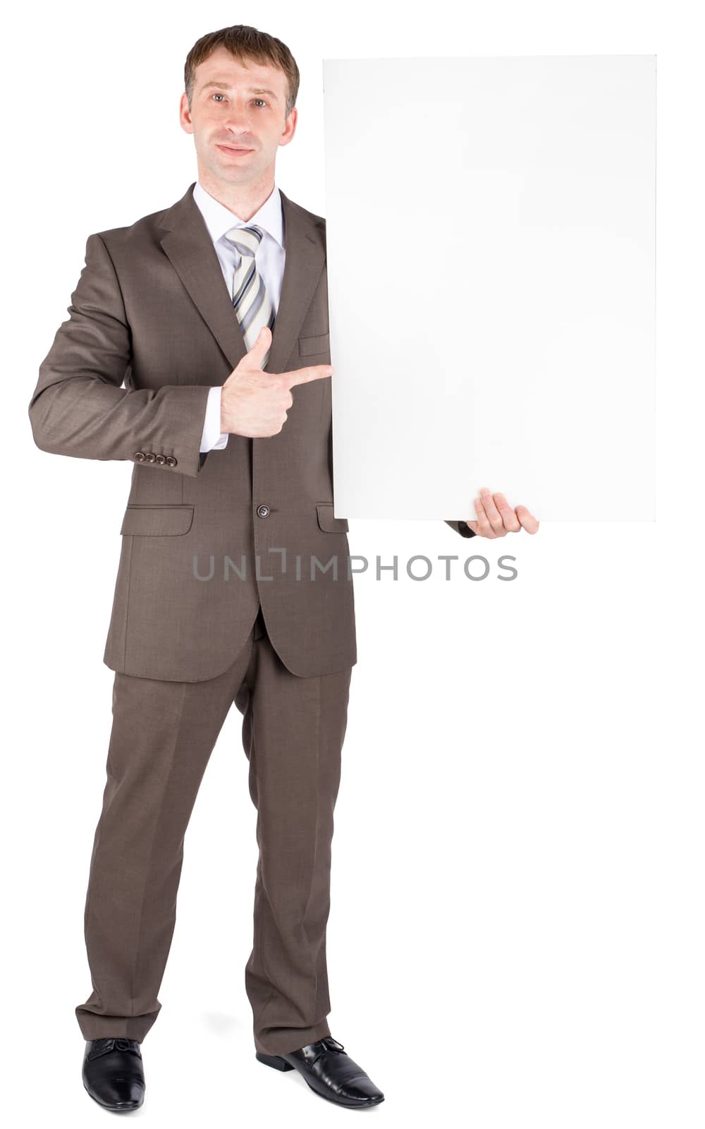 Young business guy holding blank board by cherezoff