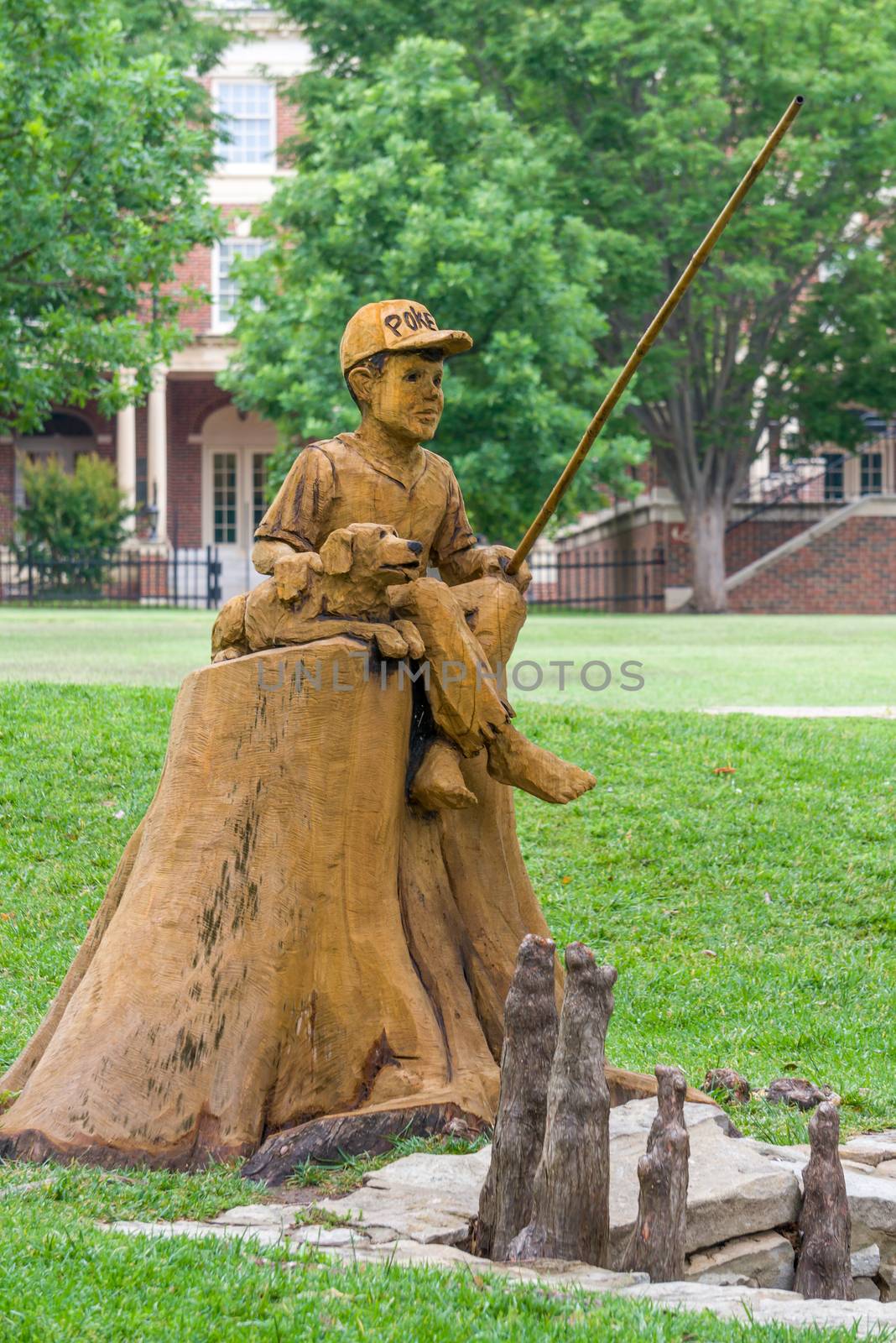 Boy and Dog Fishing Sculpture at Theta Pond by wolterk