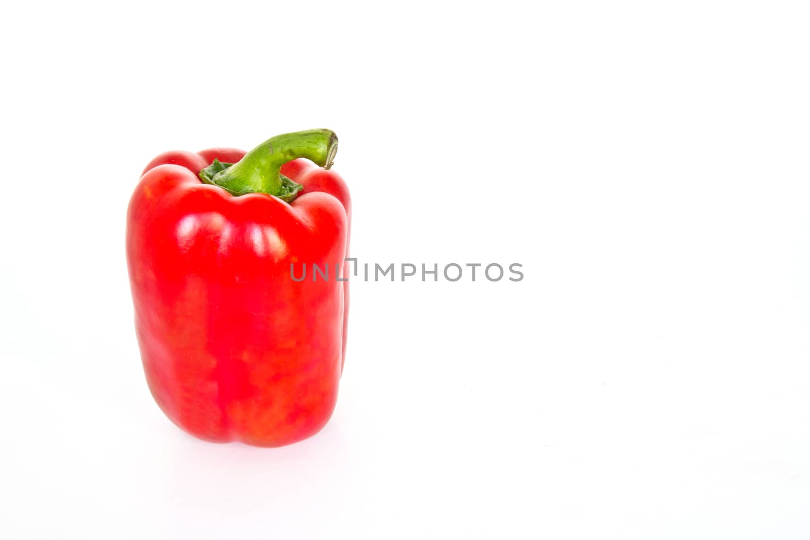 Red sweet peppers isolated on a white background 