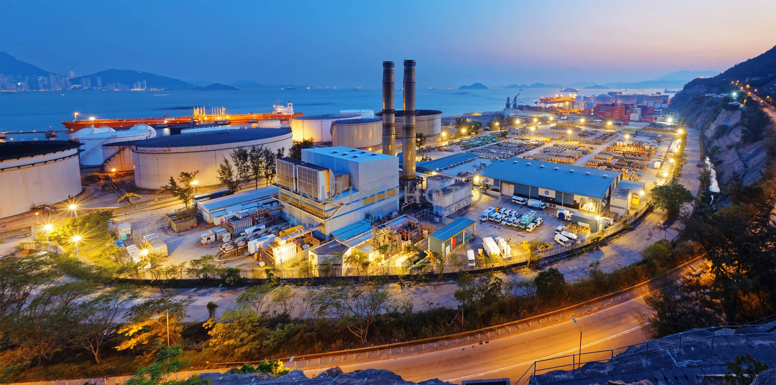 petrochemical industry on sunset , hong kong coal power station and oil tank