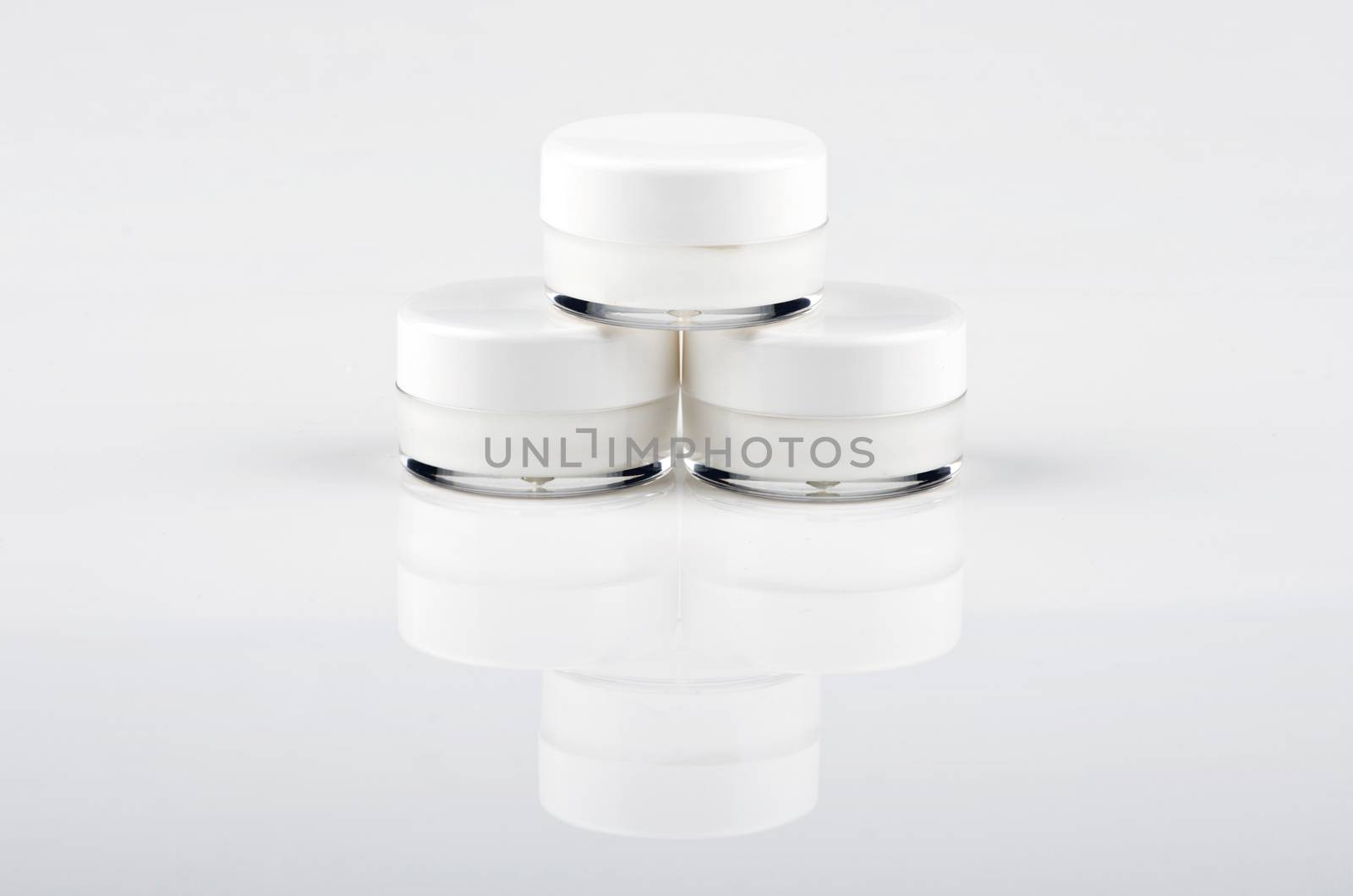 Blank white facial cream jar isolate on white background