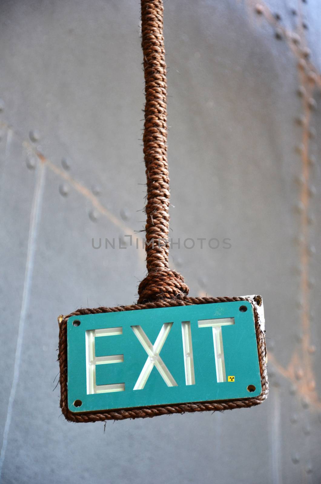 Exit sign points the way out of building