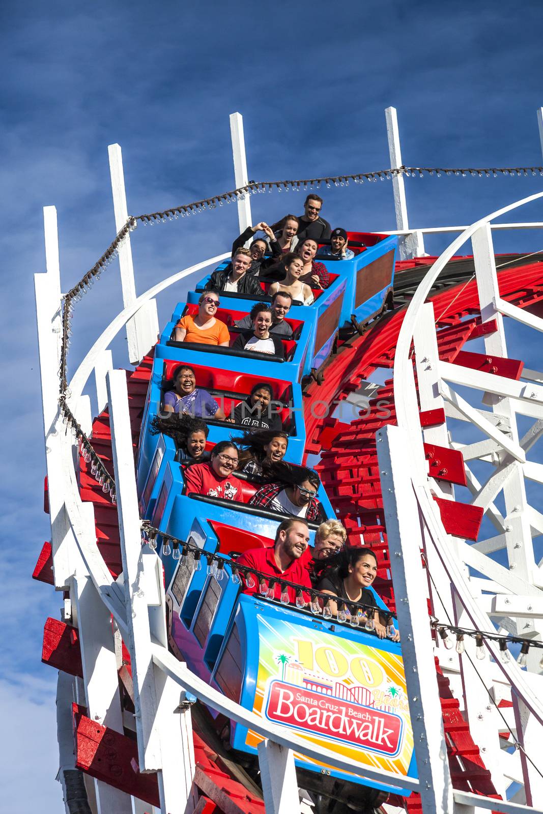 People on Giant Dipper roller coaster, Santa Cruz, California by hanusst