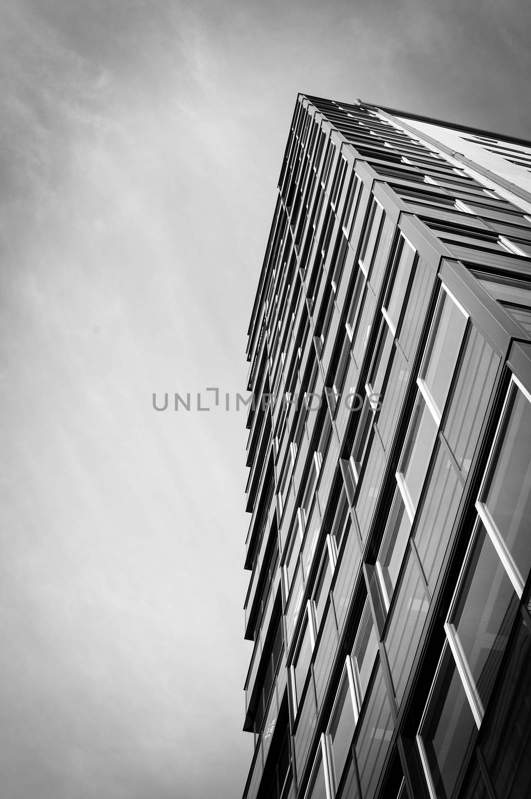 Apartment building in black and white low angle.