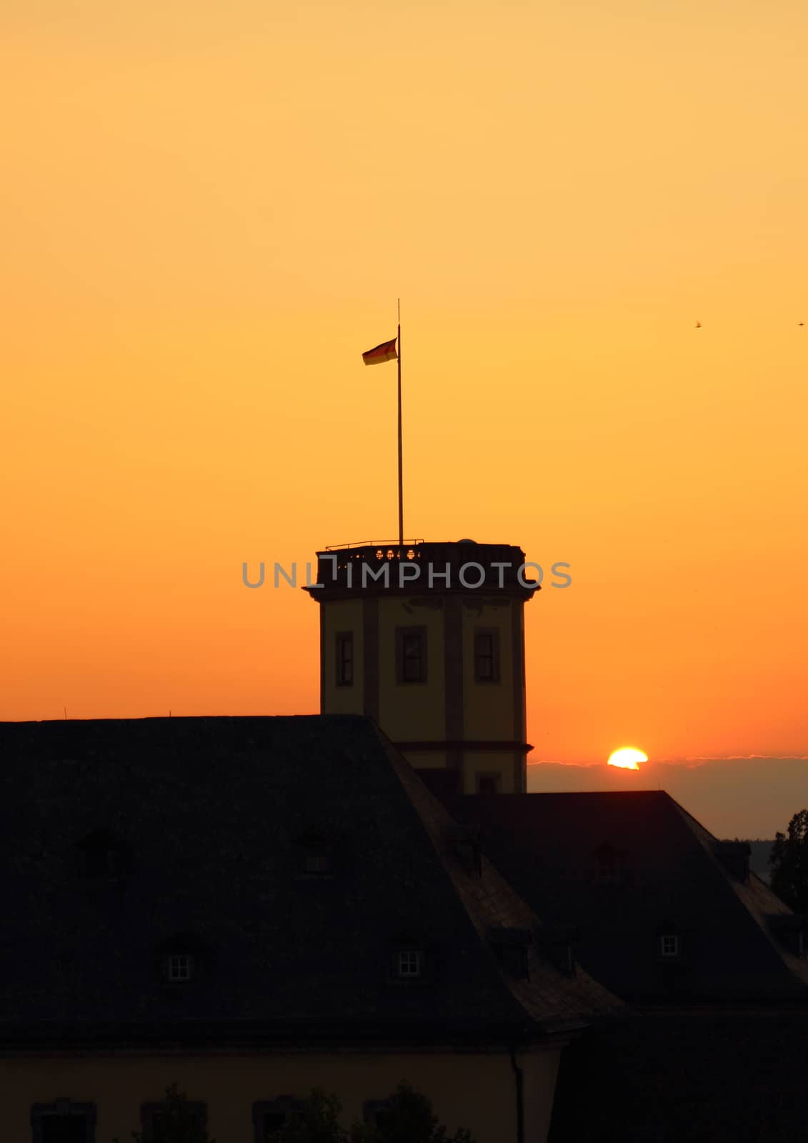 Sunset over old german castle tower by HoleInTheBox
