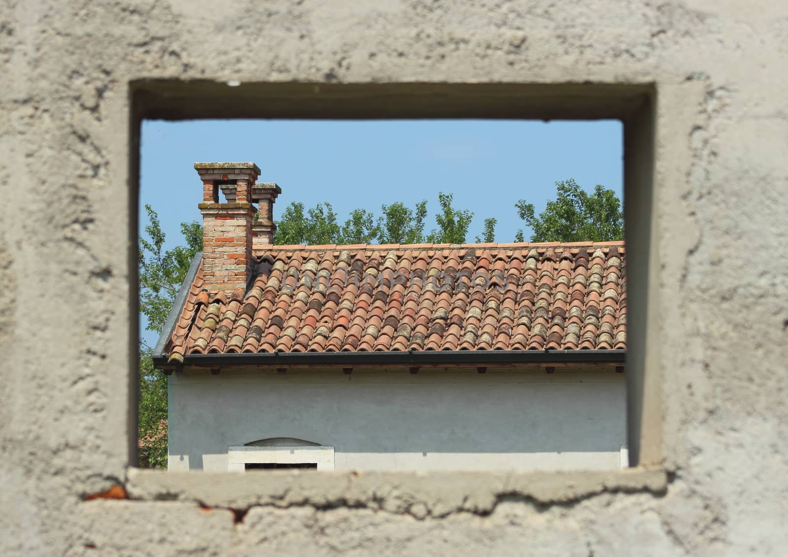 Window framing a abandon farm house