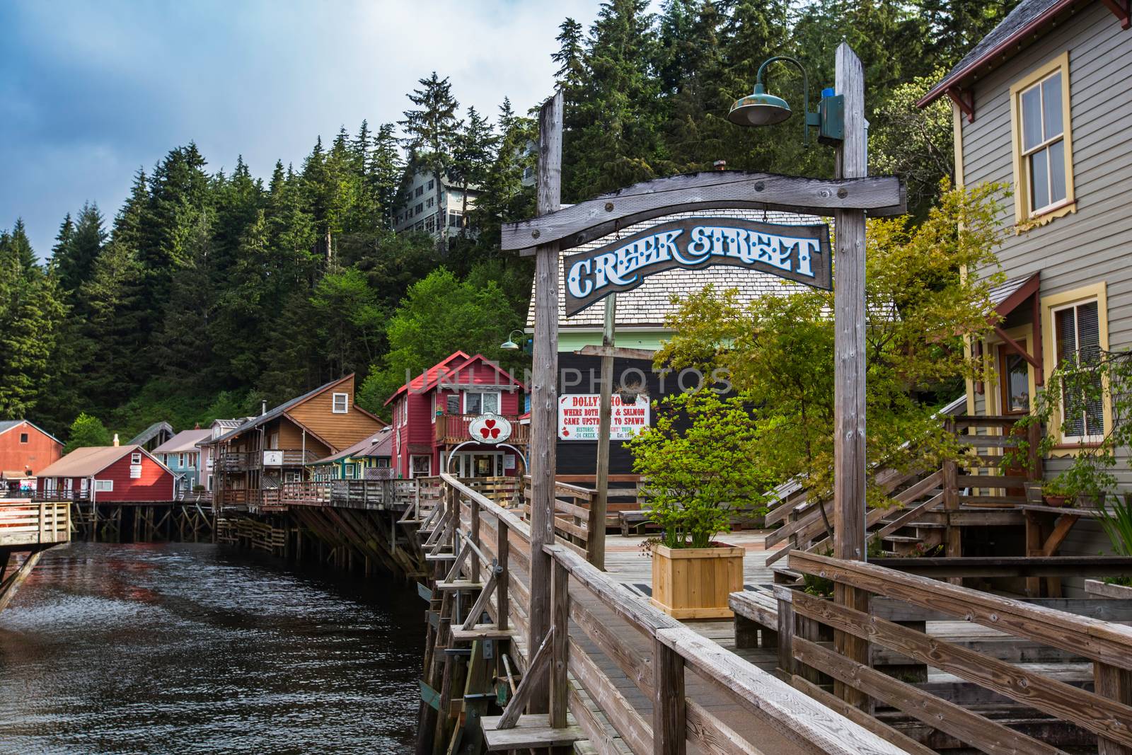 KETCHIKAN, AK - MAY 15: Current businesses relying on tourism occupying historic buildings on Creek Street on May 15, 2016 in Ketchikan, AK.