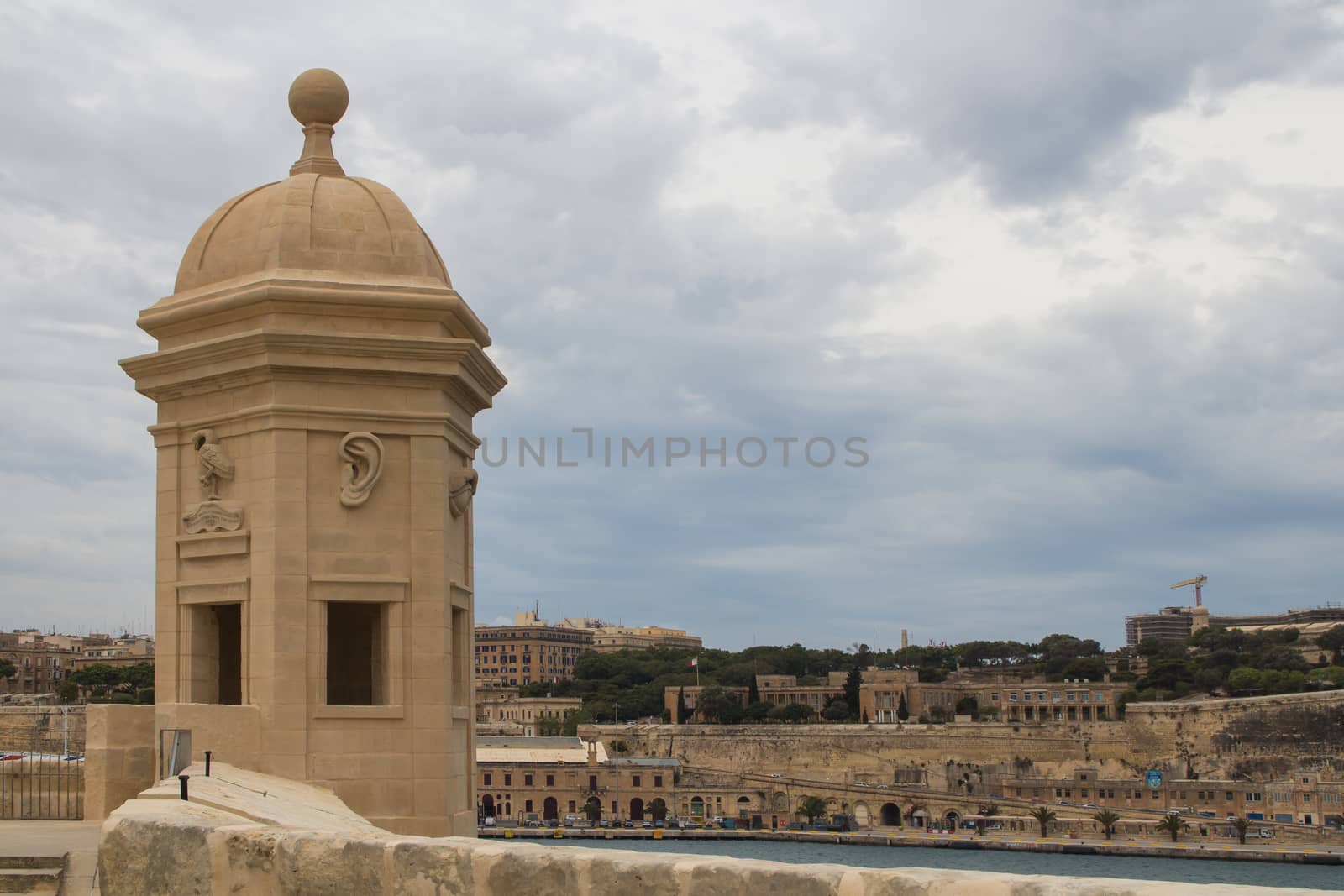 Park Gardjola Gardens in a part of fortification of the city Senglea at the mediterranean island Malta. Tower with a view on the maltese capital Valletta.