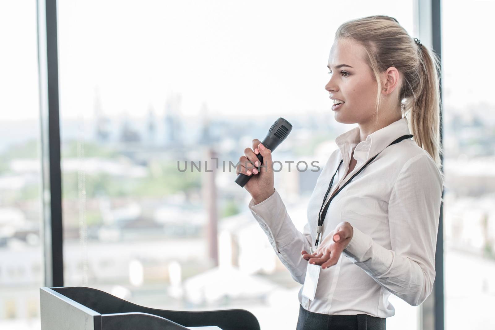 Speaker talking to audience in the conference hall