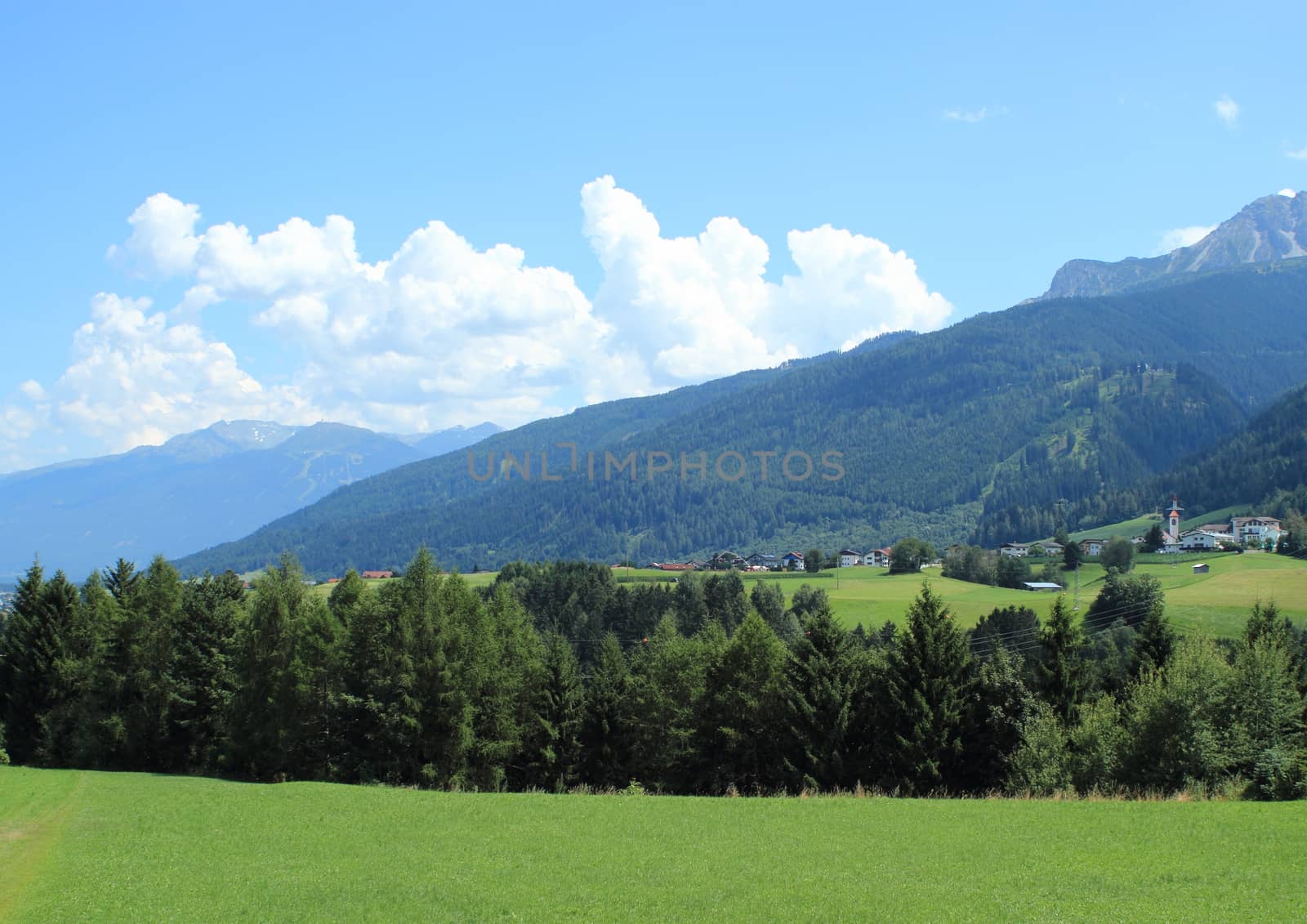 Typical view over the Alps with small village